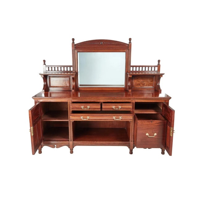 A superior example of a magnificent Gillow & Co mahogany sideboard. The quality and design is superb. An elegant looking...