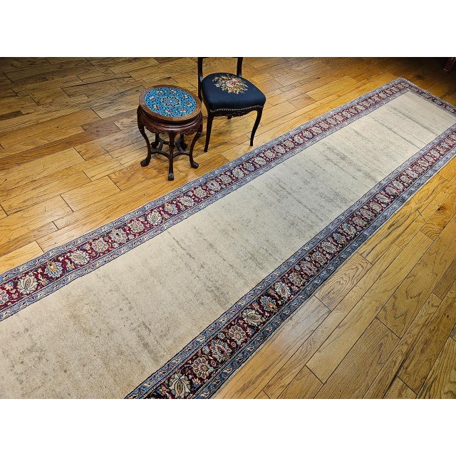 "Refined in its simplicity and rare in form, this vintage Persian Khorassan runner rug from the mid-1900s offers an...
