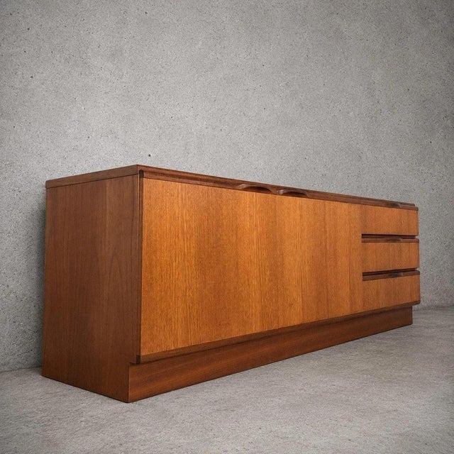 Details * Maker: McIntosh * Period: Mid Century Modern, circa 1960s–1970s * Origin: Scotland * Material: Teak veneer with...