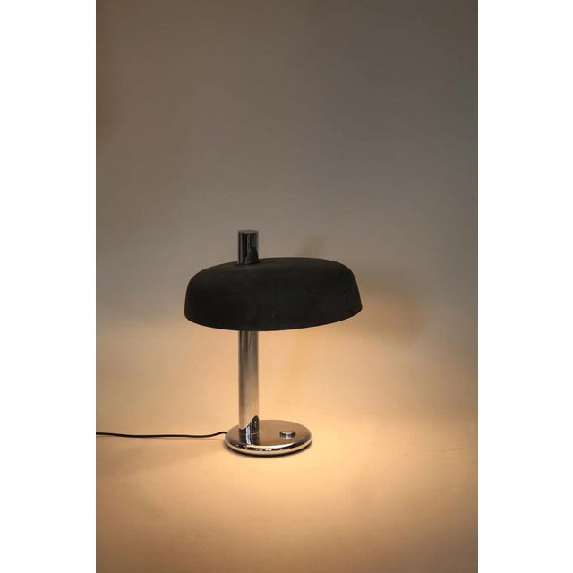 Desk lamp model 7603 designed by Heinz F.W. Stahl for Hillebrand Leuchten, Germany, circa 1960s. The lamp reflects the...
