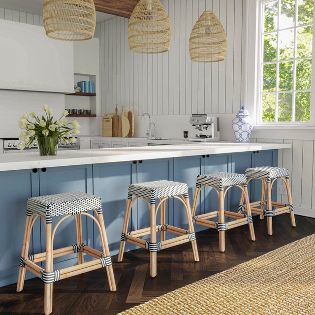 Evoking images of sidewalk tables in the Cote d'Azur, counter stools like this will give your kitchen, dining area, or...