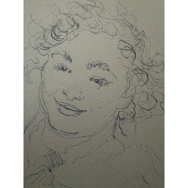 This is a lovely pencil and paper sketch of a smiling woman prepared and signed by the well known Romanian-born...
