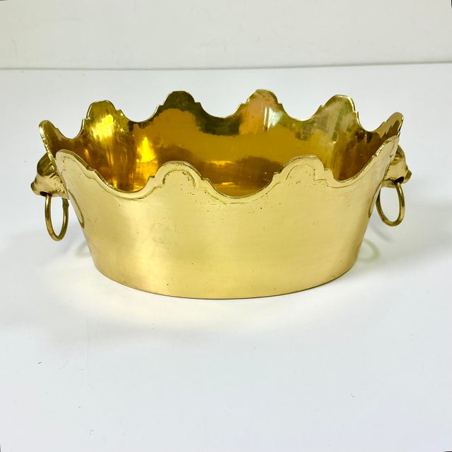 Vintage Home is pleased to present this gorgeous Brass Bowl or Catchall with a Crown edge on the rim. The piece is...