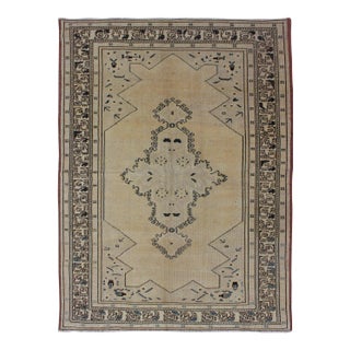 Vintage Oushak Rug With Soft Beige, Warm Taupe, and Deep Navy Blue Accents For Sale
