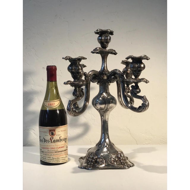 The haute couture of the gilded age and the wow factor is present in the large circa 19th century five-light Art Nouveau...