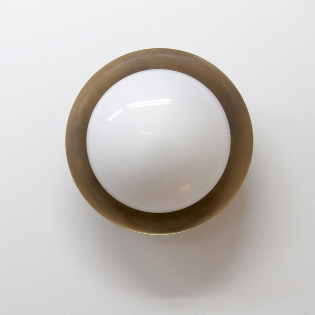 Wonderful, large version Ojo wall lights designed by Gallery L7, handcrafted and finished in Los Angeles from American...