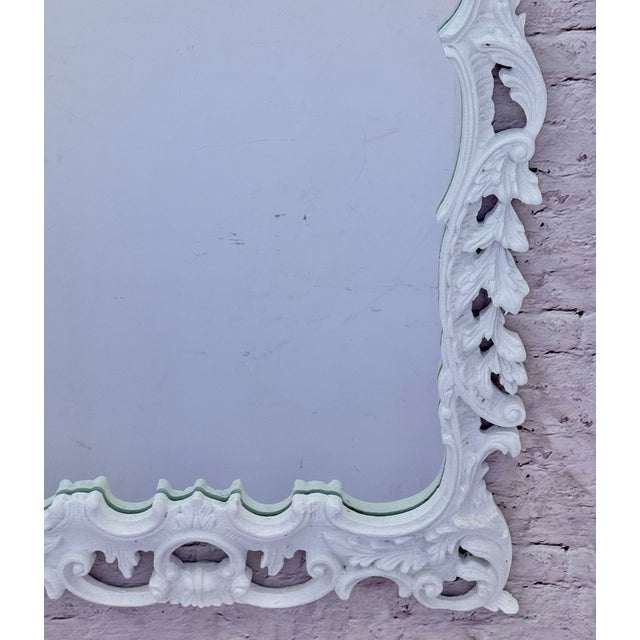 Fine George III style hand-carved and white painted rococo mirror having acanthus leaves, foliate, scrollwork throughout...