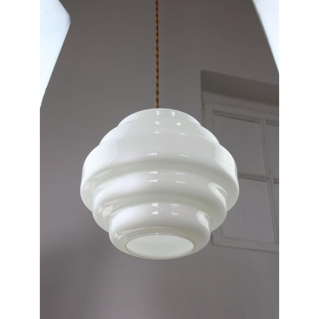 Total height of the lamp is adjustable, length of the cable alone is 140cm and can be shortened to your preference. Takes...