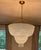 This stunning modern glass chandelier with hand rubbed antique brass trim will be a center piece to room. It is 38” high...