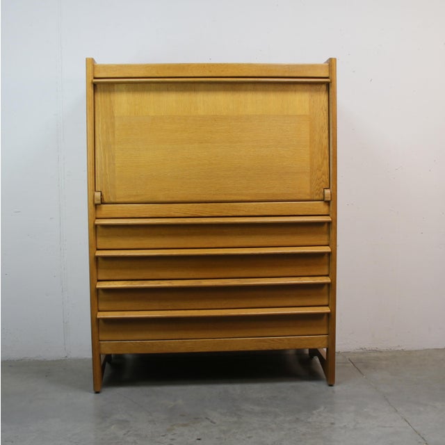 Vintage Cabinet by Guillarme and Chambrom, 1960s, in Very Good conditions. Designed 1960 to 1969 This piece has an...