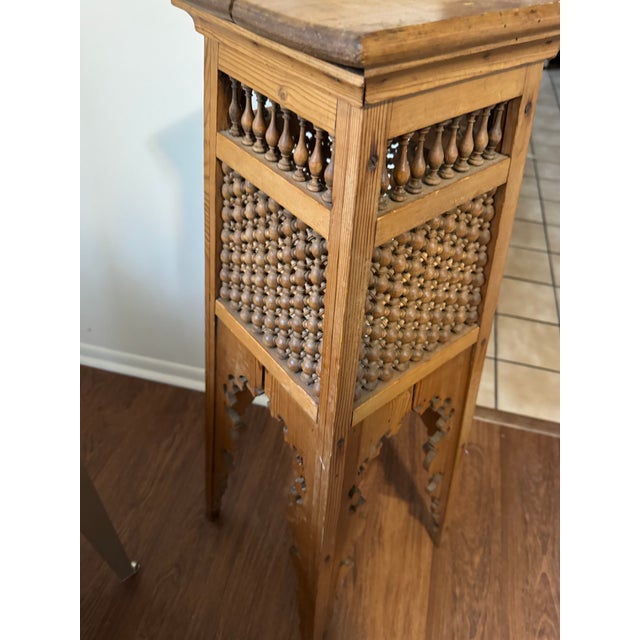 Antique Moorish Hand-Carved Wooden Pedestal Plant Stand Add an exotic touch of late 19th/early 20th-century elegance to...