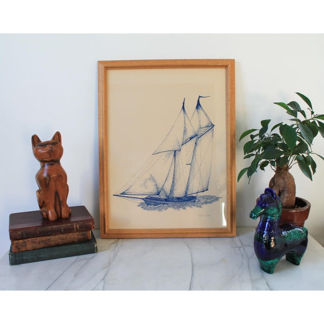 Signed 1980's framed sailboat lithograph. Some light age wear to wood frame. Ready to hang.