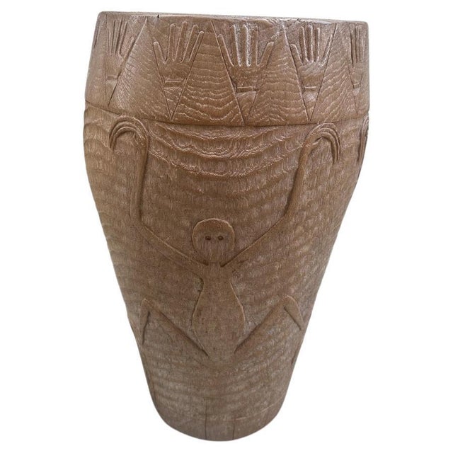 This exquisite antique drum, crafted from solid teak wood, hails from the lush landscapes of Bali. The top has been...
