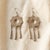 Add a touch of vintage bohemian flair to your collection with these stunning Hill Tribe style silver dangle earrings....