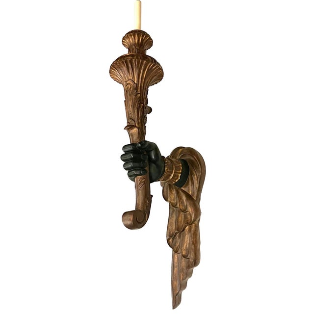 Beautiful Italian Venetian hand carved wooden hand / torch sconces. The hands are lacquered in black, while the torch and...