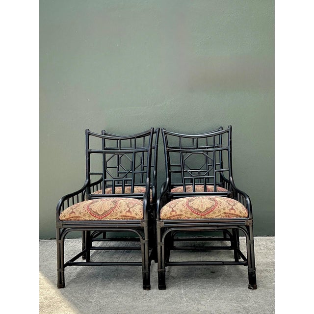 This set of four vintage rattan chairs by Palecek beautifully showcases the brand’s renowned expertise in natural...