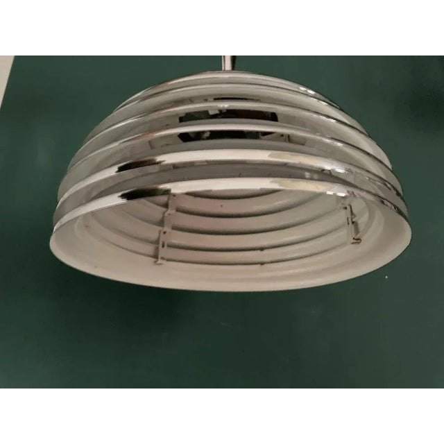 A splendid and rare example of the Space Age hanging light designed by Kazuo Motozawa for Staff in the period 1970-79....