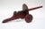 Folk Art toy cannon in original black and red paint, circa 1930s, USA. Very minor paint loss throughout and edge loss to...