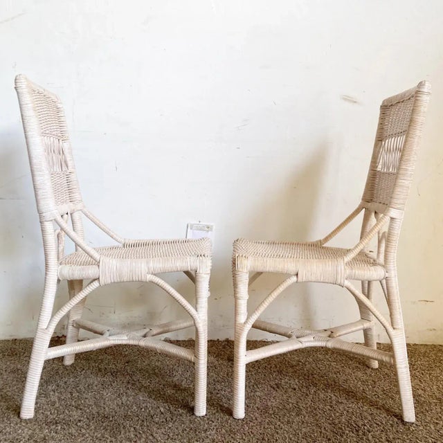 These Boho Chic side chairs, crafted in wicker and rattan, showcase a timeless white-washed finish. The pair effortlessly...