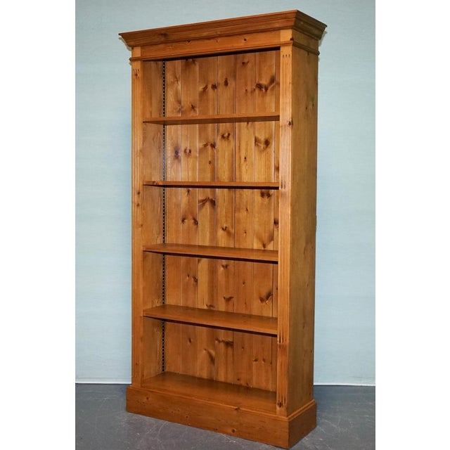Antiques of London This antique English open bookcase, crafted from solid pine, showcases the timeless charm of 19th to...