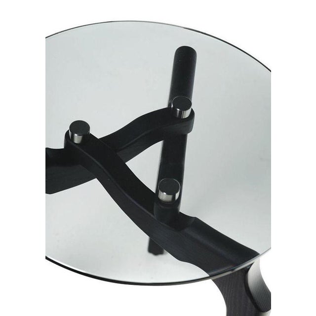 Carline side table by oscar tusquets for bd barcelona bordering the surreal behind the glass. The carlinas tables create...