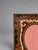 A fine pair of small decorative tabletop or wall hanging picture frames in the Napoleon III or late Victorian Boulle...
