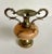 Here is a lovely, petite vase that is made from cast silver finish metal with a natural stone center. As you can see, it's...