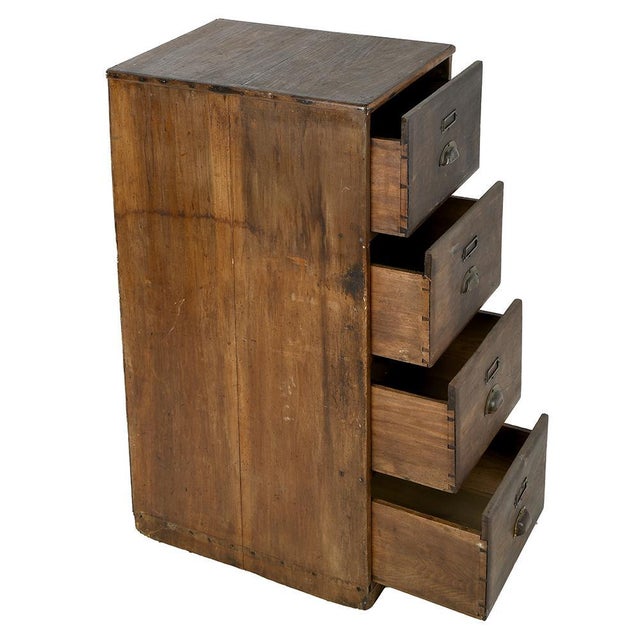 This solid wood 4-drawer storage unit combines practicality and robustness, offering timeless charm to any interior....