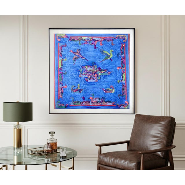This is a professionally framed authentic Hermès silk scarf called "La mare aux canards" and released in 1981. Designed by...