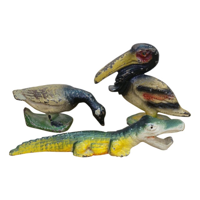 Mid 20th Century Wilton John Wright Cast Iron Figural Bottle Openers Pelican Alligator Goose - Set of 3 For Sale