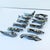 A delightful set of twelve Art Deco silver-plated figural knife rests, crafted in the manner of Christofle, France, 20th...