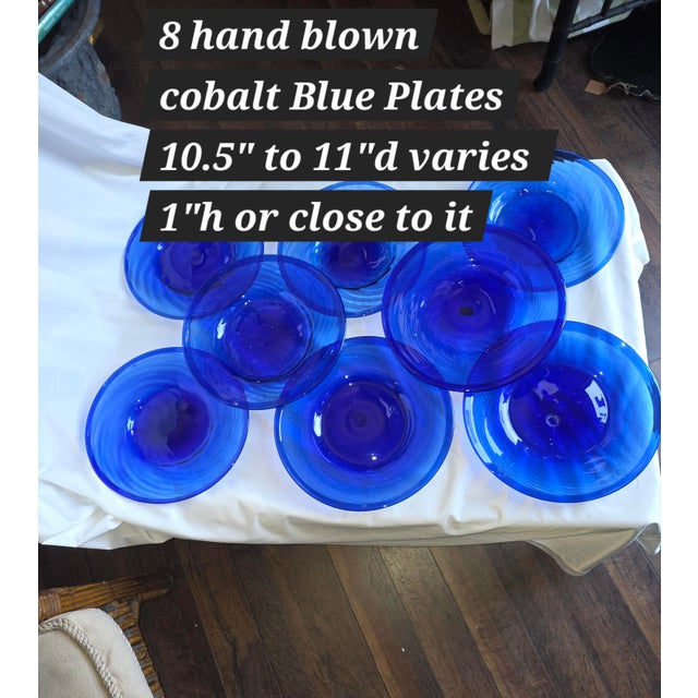 Pretty blue blown glass plates...great for decorative purposes...displayed on a wall or in a cabinet or a pre plate...