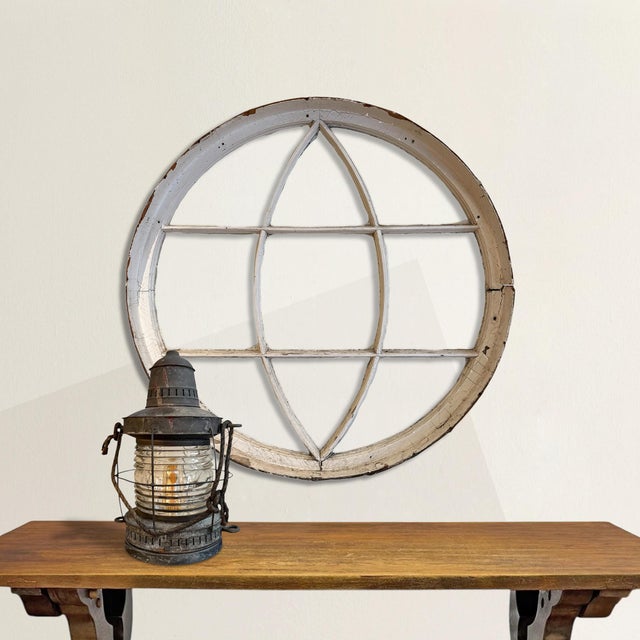 It once held the best light in the house. A large, round 19th century American Colonial Revival window, oculus in form,...