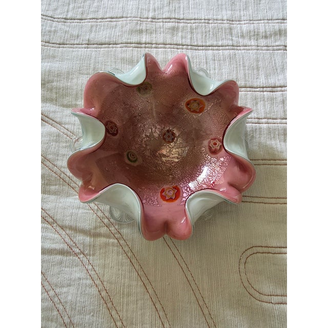 This product is a beautiful vintage Murano Millefiori art glass ruffled bowl produced by Fratelli Toso in Italy. The...