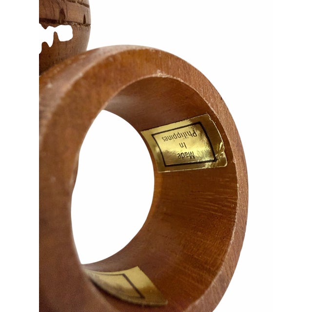 Vintage mid century carved zigzag pattern wooden napkin rings. Each measures 1” w x 2” diameter.