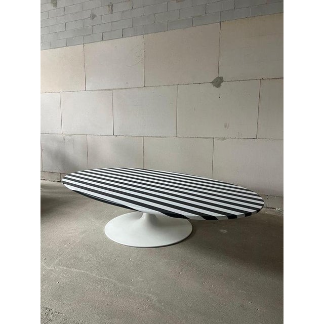 A striking example of British Space Age design, this iconic Surfboard coffee table was designed by Maurice Burke for...