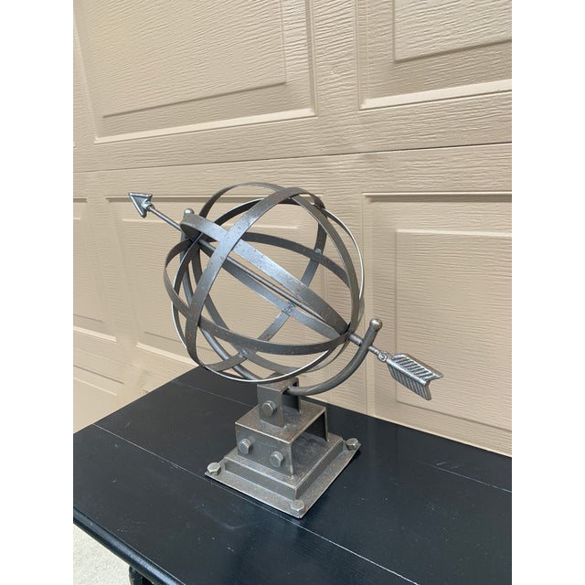 A stunning contemporary iron garden armillary sundial USA, Late 20th Century Measures: 19"W x 10"D x 15"H Very good...