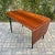 Newly refinished mid century modern asymmetric rosewood writing desk on black lacquered base, made in Denmark c. 1970s....