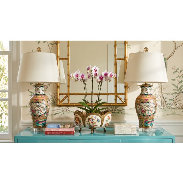 Standing at a substantial and commanding 29 inches tall, this table lamp possesses true decorator-scale proportions. In an...