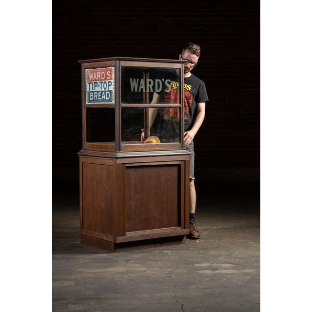c. 1910s-1920s; Ward Corby Co. - Chicago, IL Early 20th-century oak display case featuring original painted glass. Once a...