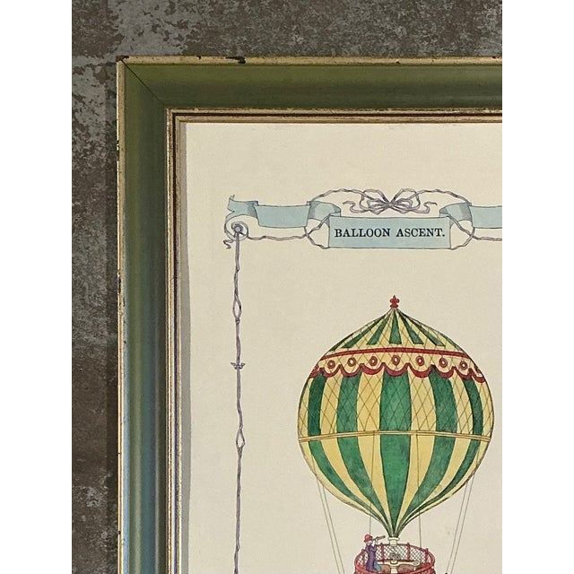 This captivating vintage framed print celebrates the romance and adventure of early ballooning, depicting a richly...