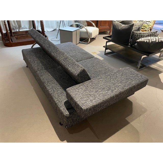 Very unique sofa which features arm and back that fold up and down. Enough space for kids to sleep on when arm and back...