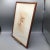 graphite copy of da Vinci's famous portrait in red chalk. Presented in a medium walnut wood frame. Unsigned. Description...