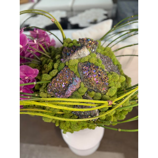 Botanical mix floor orchid arrangement featuring a graceful, natural design with lush greenery and elegant orchid blooms....