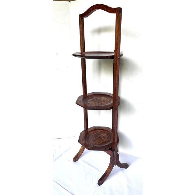 Handsome antique Edwardian 3-tier folding cake stand (frequently referred to as a muffin or pie stand), dating from the...