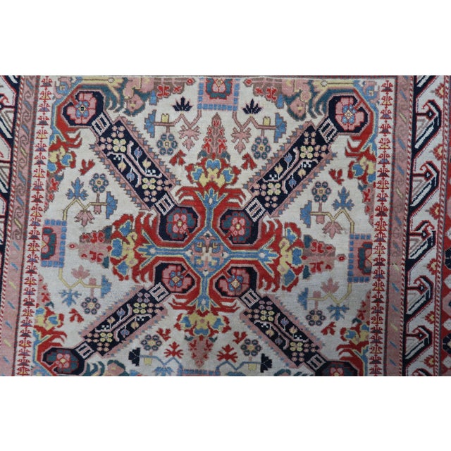 Introducing our exquisite Handmade Vintage Caucasian Zeyhur Rug from the 1950s. This captivating rug showcases a vibrant...