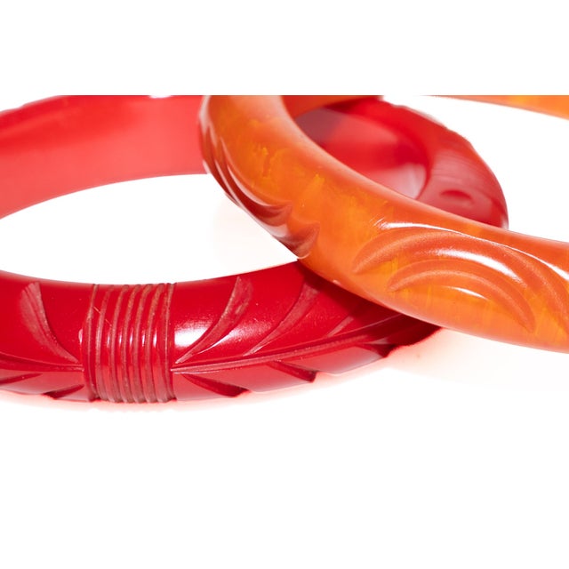 Vintage Carved Bakelite Bangle Bracelets in Red and Orange, 1930's, Pair Of For Sale - Image 10 of 17