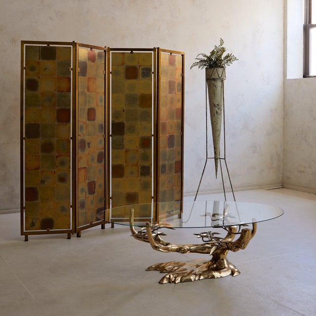 A four-panel screen that offers two moods in one piece: golden mosaic on one side, inky velvet on the other. Hand-gilt...
