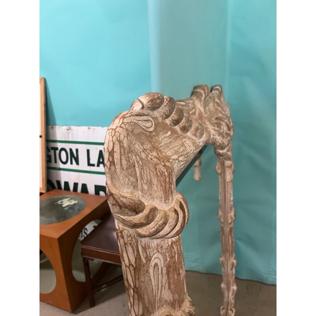 An impressive and exceptionally large vintage Italian carved wood mirror, circa 1980s. This substantial statement piece...