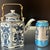 Vintage hand-painted teapot with a blue and white Chinoiserie design, circa 1970s. This teapot measures 7.25" high by 7"...